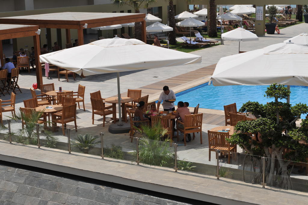 Capital Coast resort y Spa Paphos Restaurante foto
